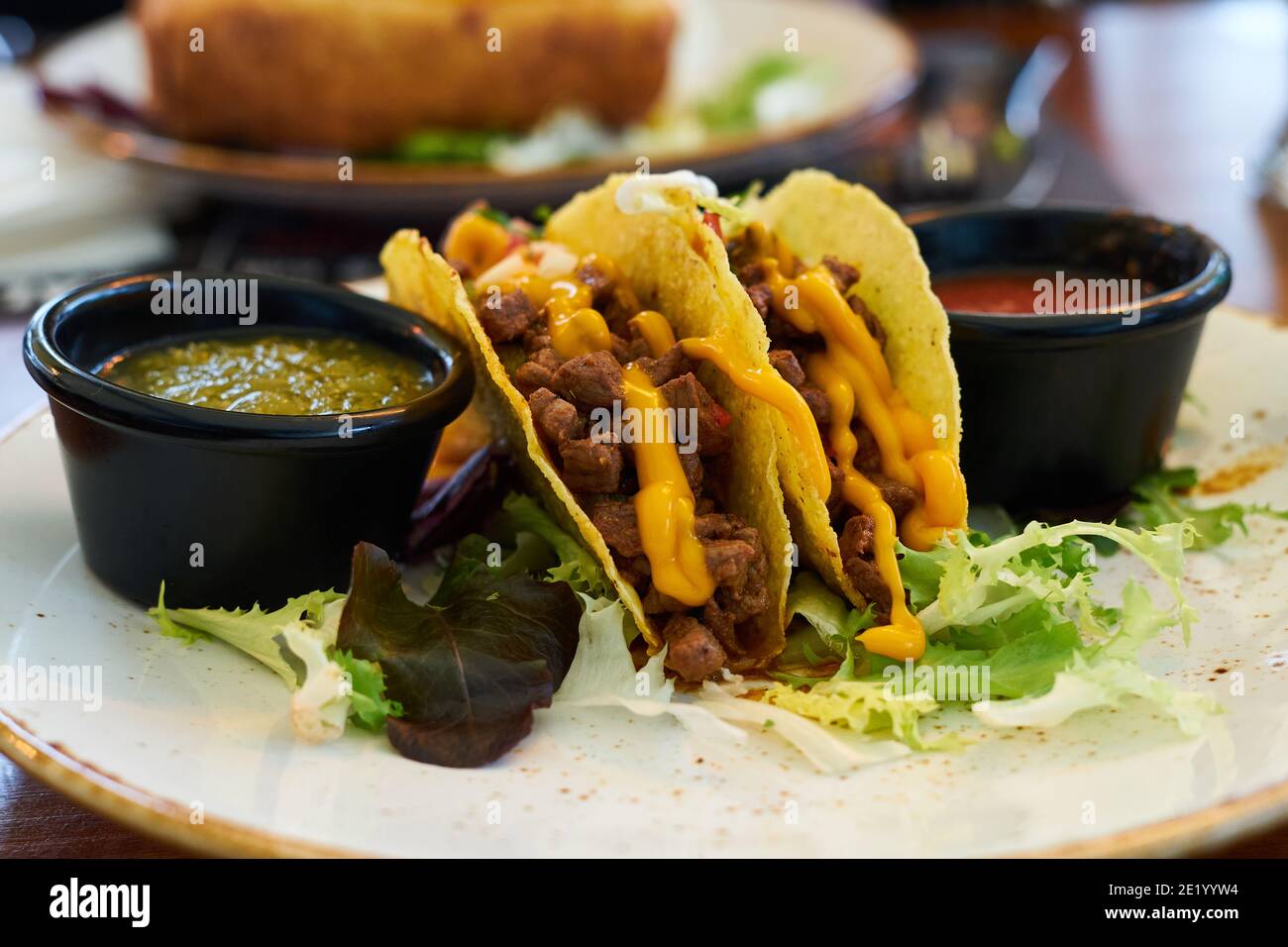 Mexican food, meat tacos with spicy sauces, selective focus Stock Photo