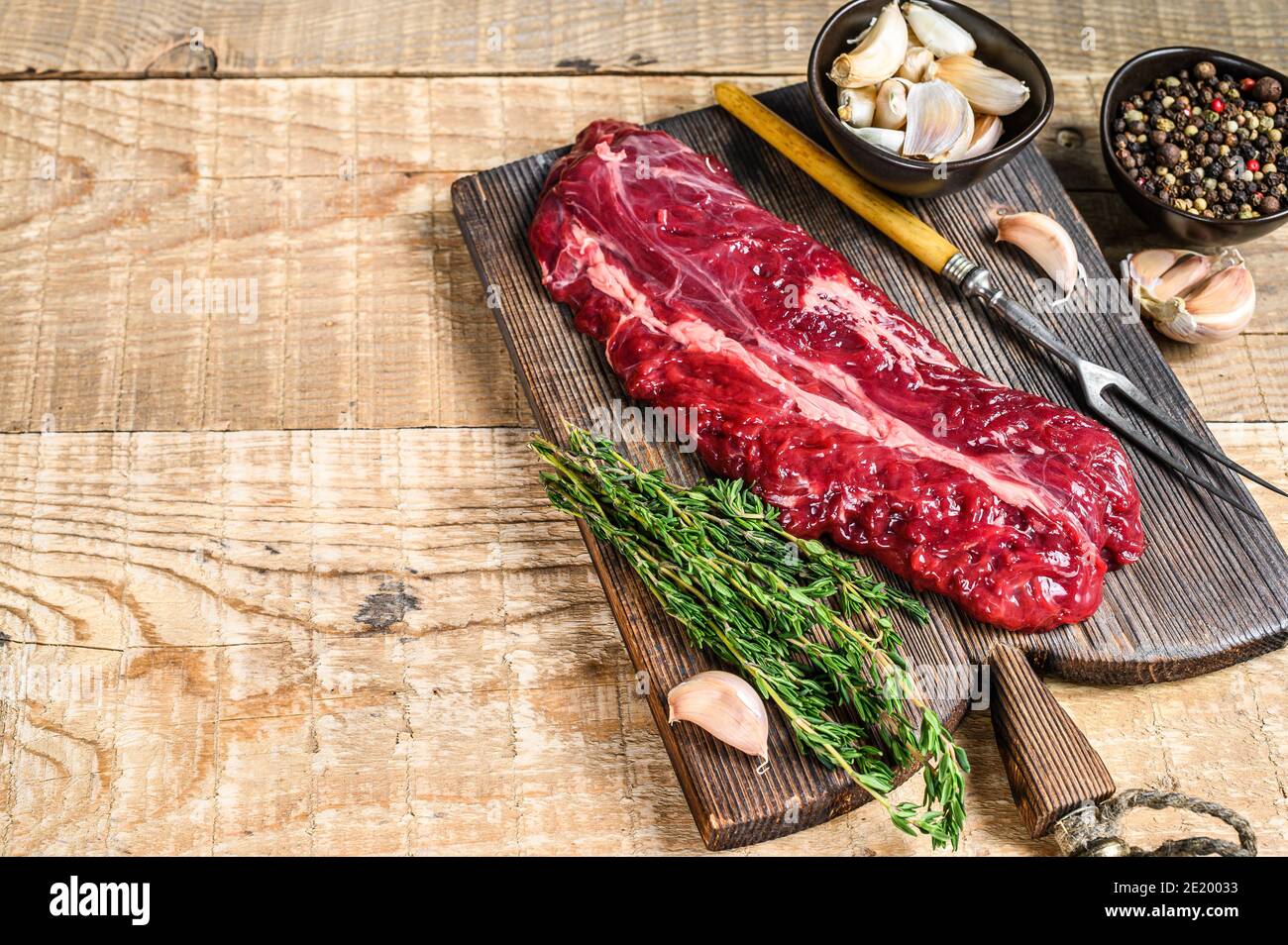 Butchers choice steak Onglet Hanging Tender beef meat. wooden background. Top view. Copy space Stock Photo