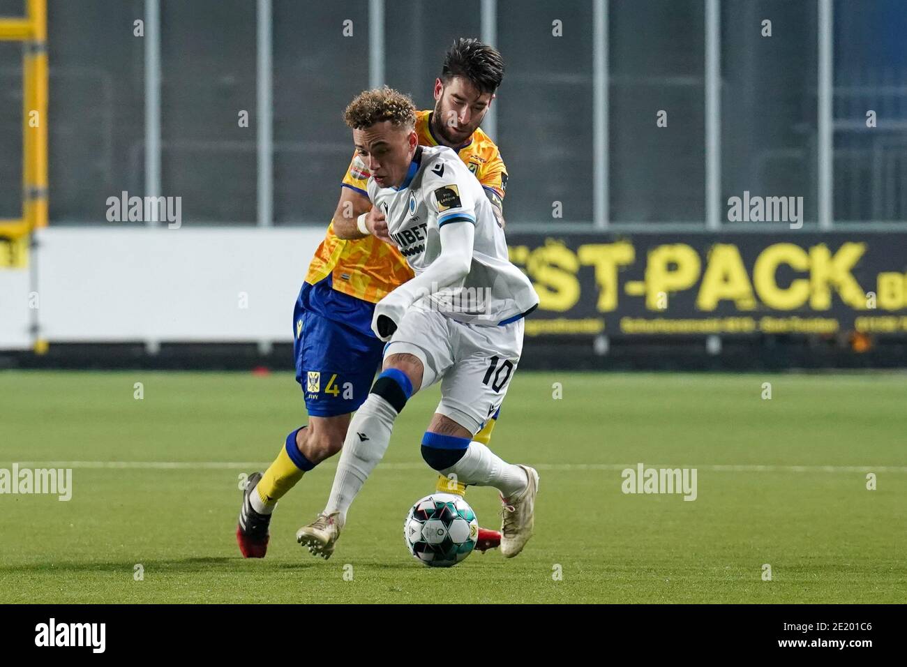 SINT TRUIDEN, BELGIUM - JANUARY 10: Pol Garcia of Sint Truidense VV, Noa Lang of Club Brugge during the Pro League match between STVV and Royal Antwer Stock Photo