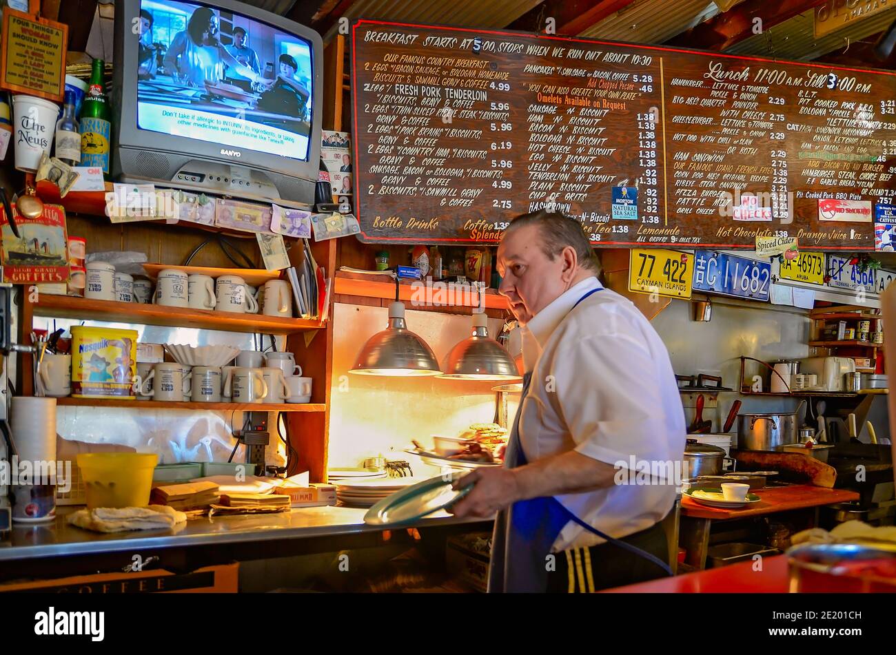 Abe Whitfield cooks breakfast at his diner, Abe's Grill, March 5, 2012, in Corinth, Mississippi. Stock Photo