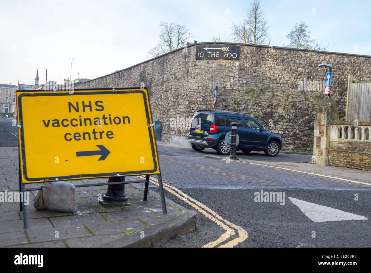 NHS Covid 19 vaccination centre Bristol zoo road sign post Stock Photo