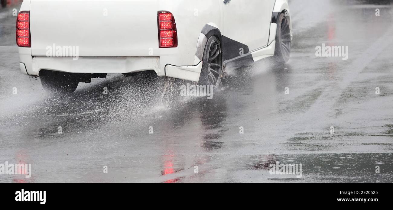 Emergency braking car on wet road Stock Photo