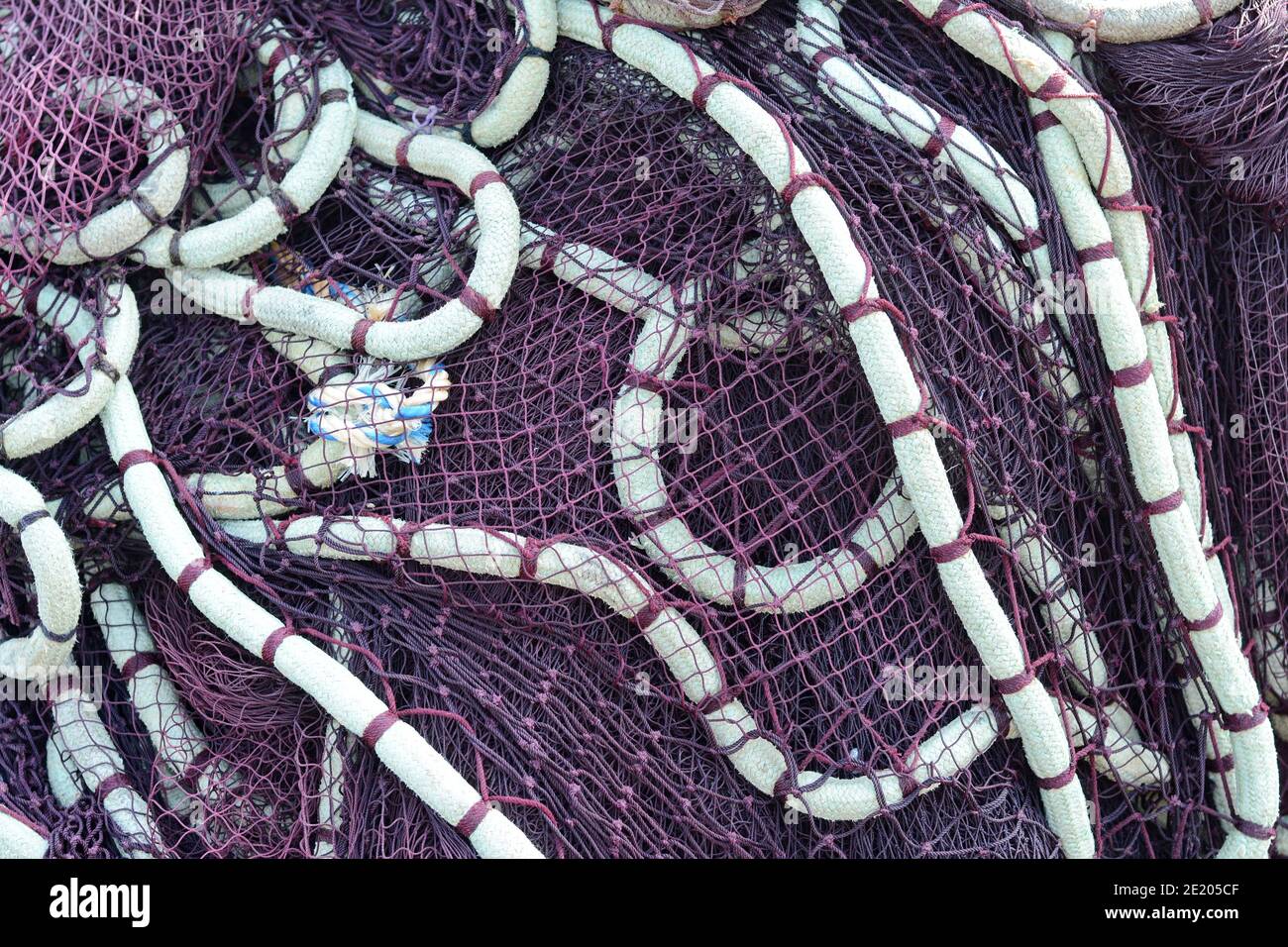 Marine networks Fishing equipment or rigging as texture background with  natural light and shadow. Fishing nets and ropes for industrial fishing  Stock Photo - Alamy