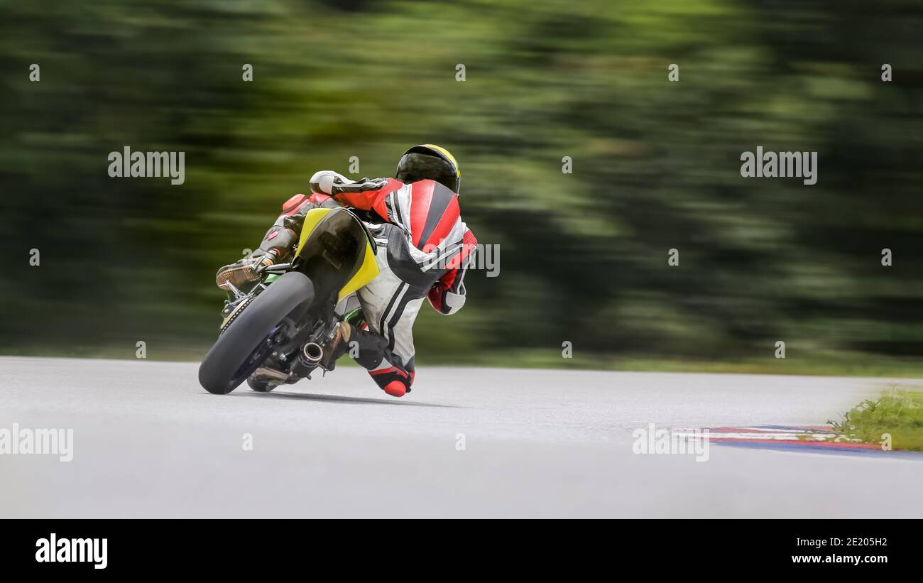Motorcycle Practace Motorcycle practice leaning into a fast corner on track Stock Photo - Alamy