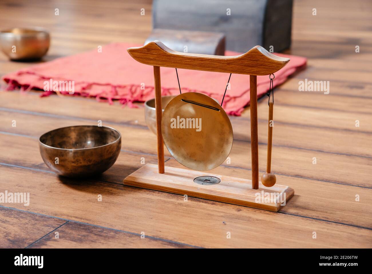 Tibetan singing bowls on the floor in yoga class, sound therapy concept