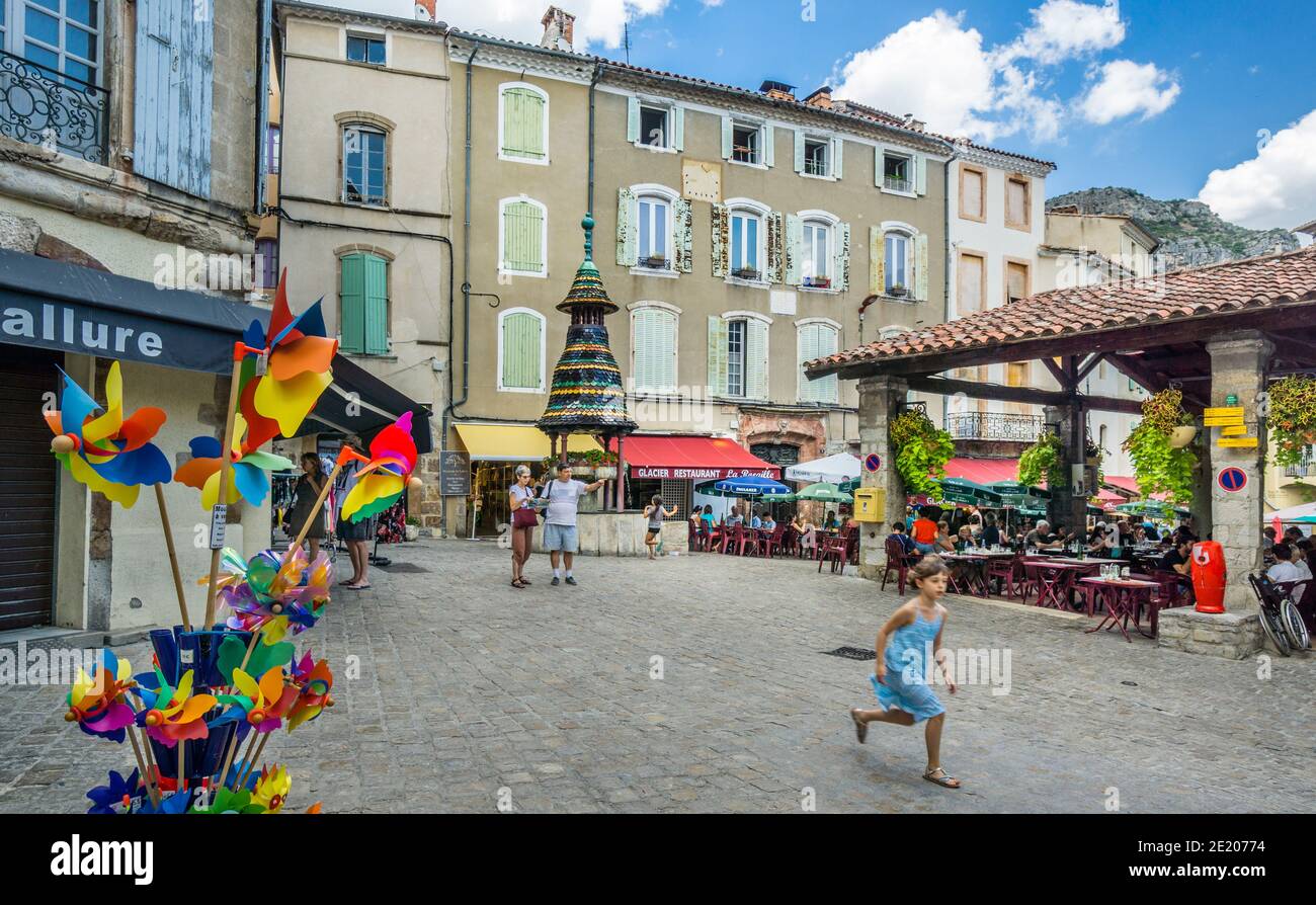 former Grain Market Hall on Place Couverte and oriental style  Pagoda fountain in the ancient town of Anduze, Gard department, Occitanie, Southern Fra Stock Photo