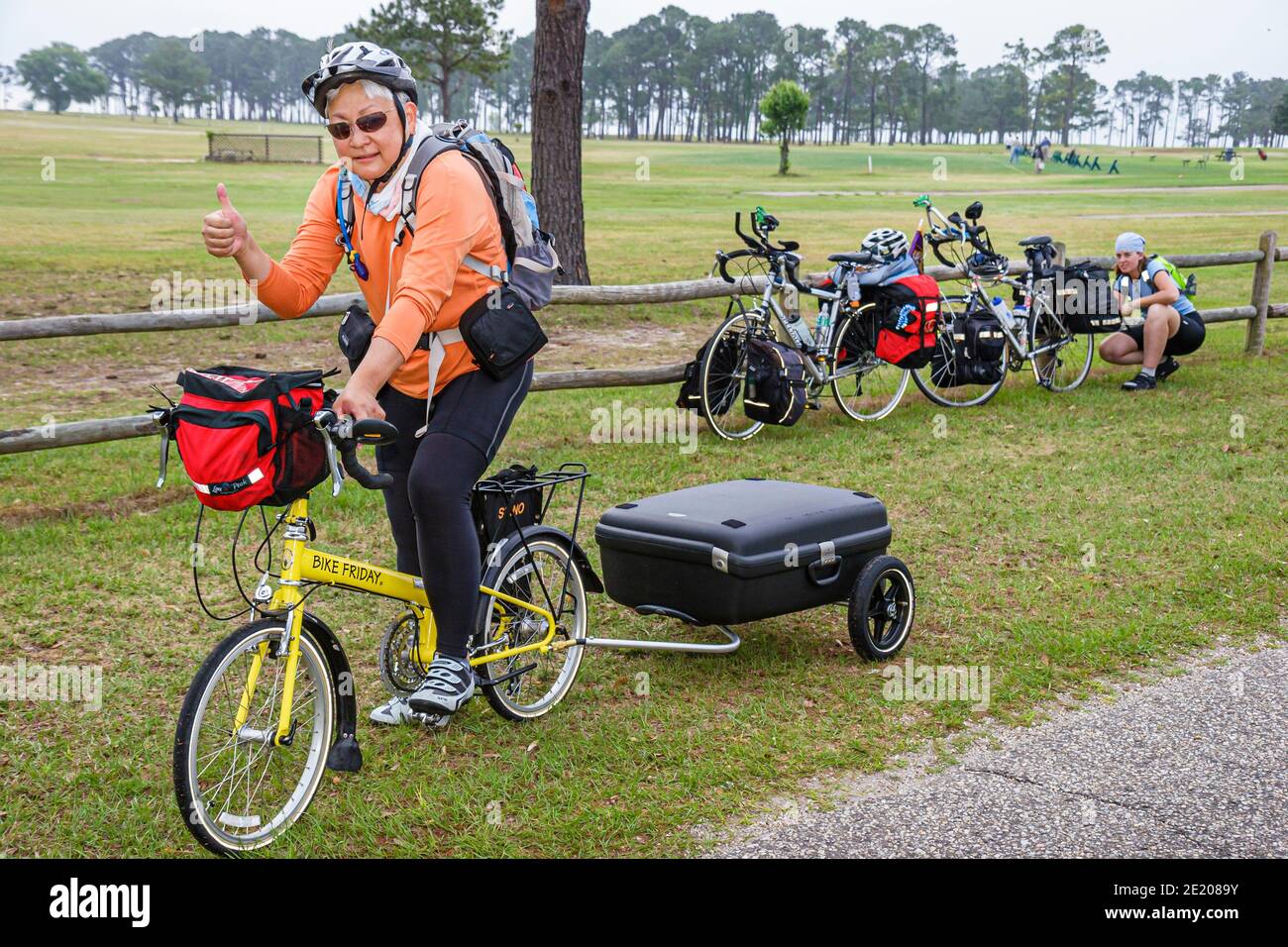 Alabama Mobile Brookley Center centre Underground Railroad Adventure,Bicycle Highway Route Asian woman female riding thumbs up, Stock Photo