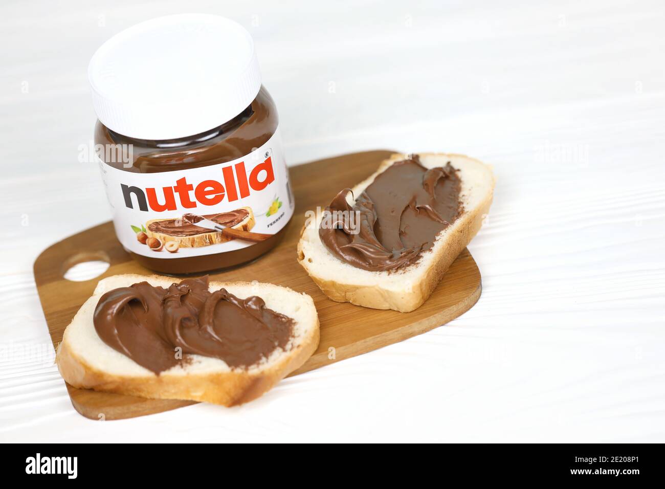 KHARKOV, UKRAINE - DECEMBER 27, 2020: Nutella glass can and spread on  freshly baked bread. Nutella is manufactured by the Italian company Ferrero  firs Stock Photo - Alamy