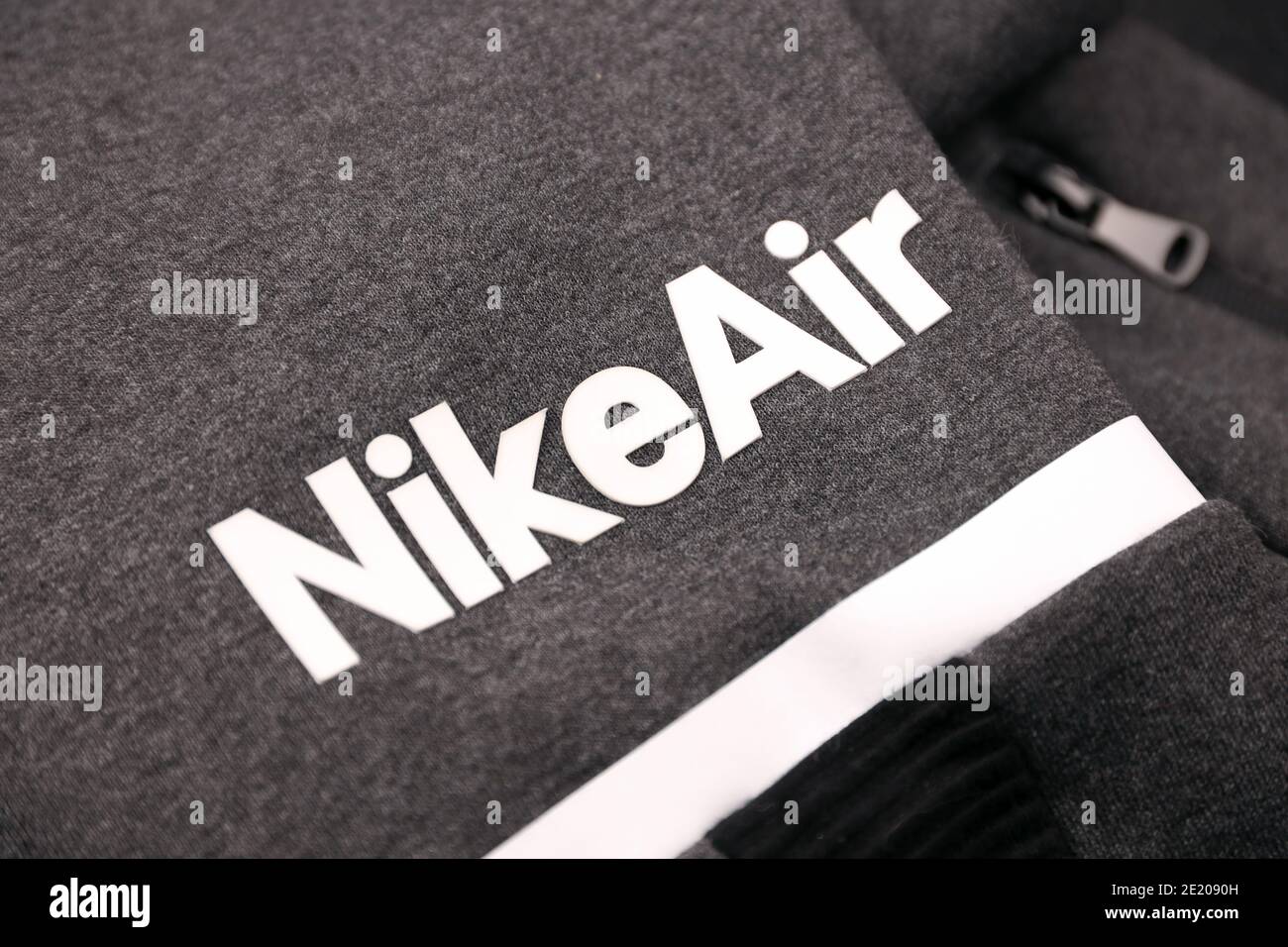 KHARKOV, UKRAINE - DECEMBER 20, 2020: Nike air logo on grey sportwear  fragment. Nike is American multinational corporation engaged in  manufacturing an Stock Photo - Alamy