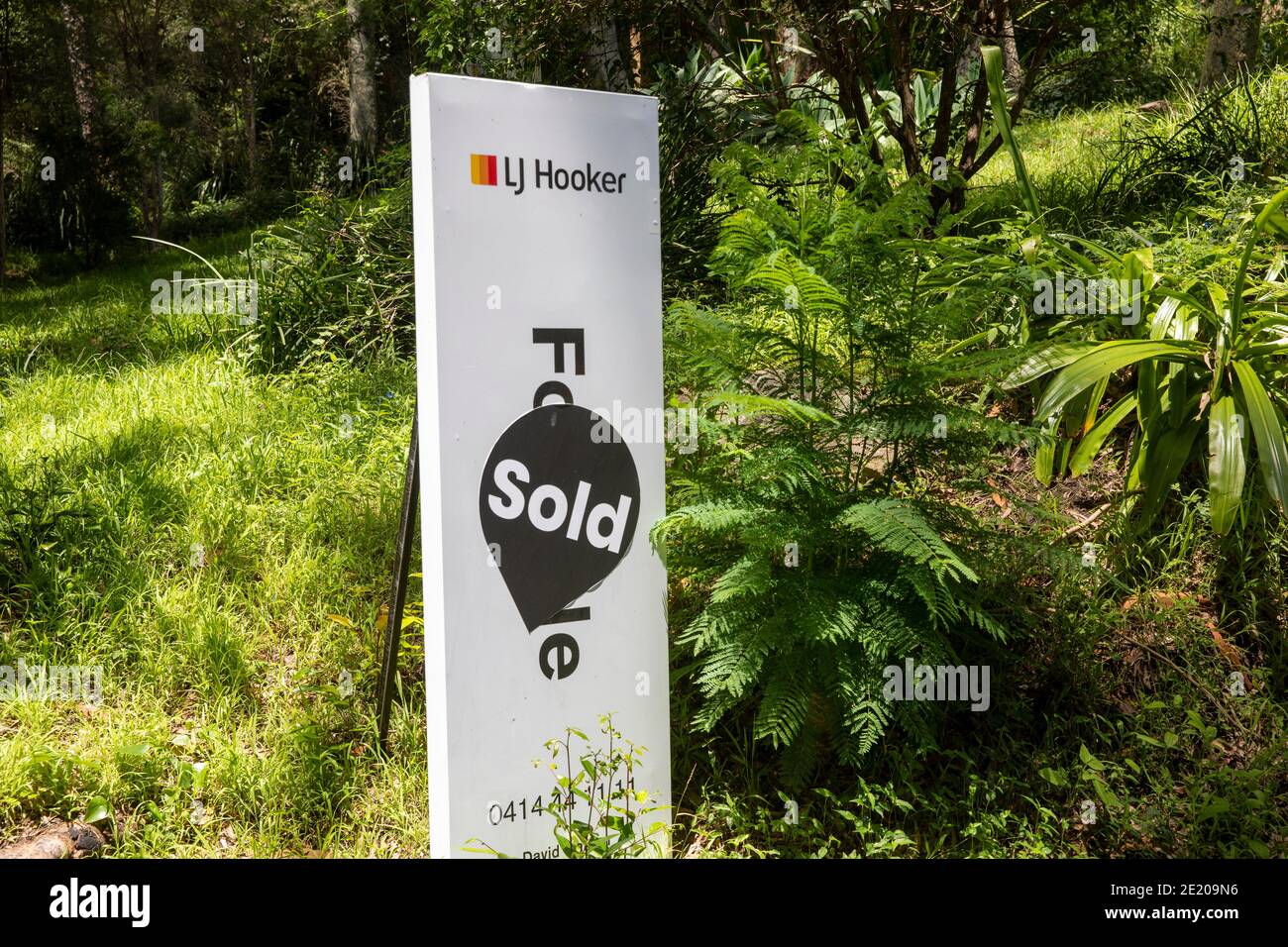 House agents board with sold sticker, Clareville,Sydney,Australia Stock Photo