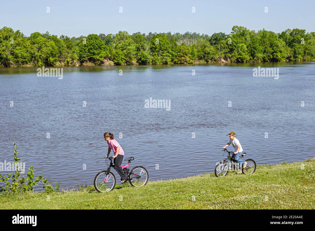 Alabama Monroeville Isaac Creek Campground,Claiborne Lake Alabama River Lakes water,girl boy bicycles riding bikes, Stock Photo