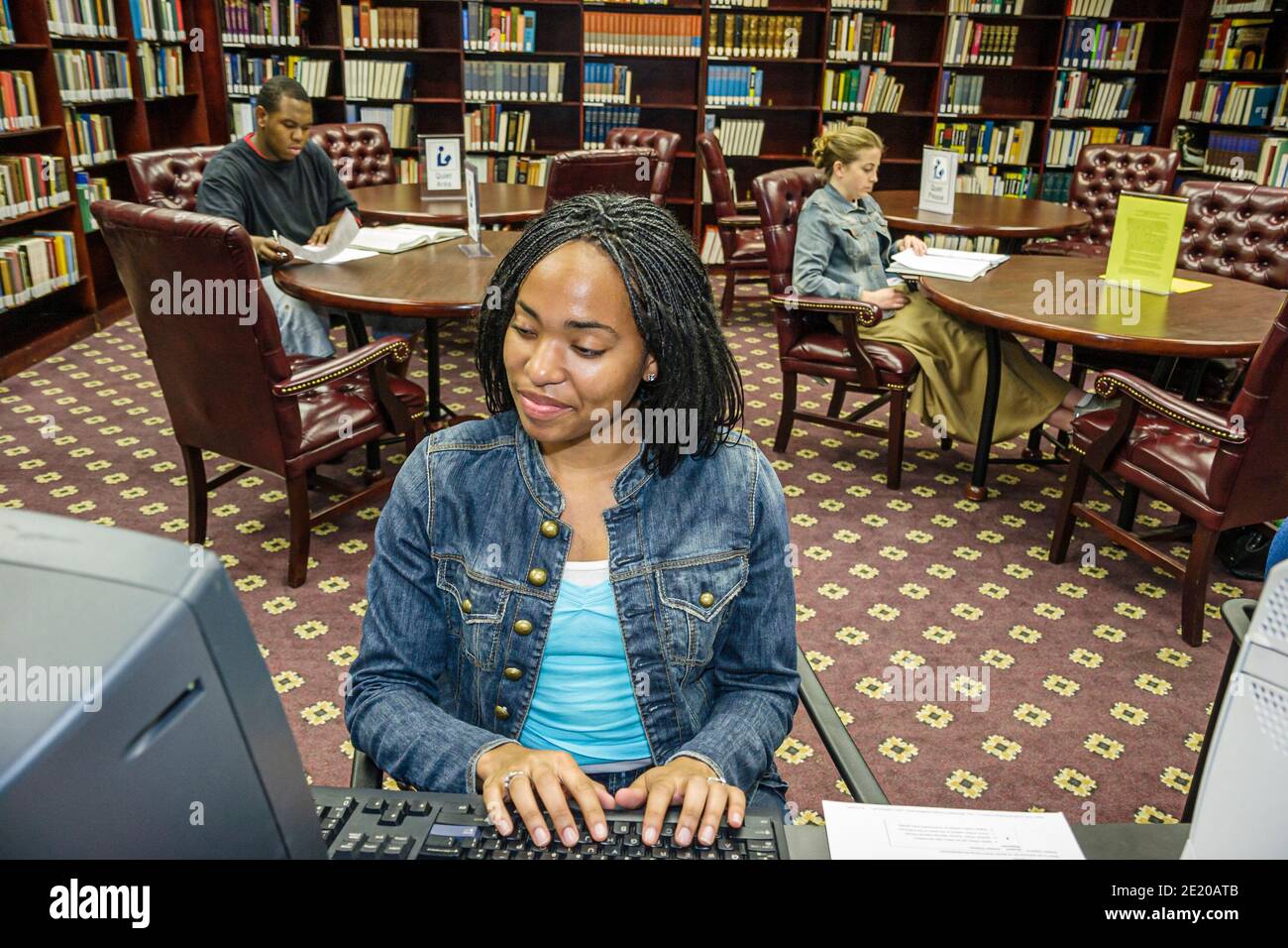 Alabama Monroeville Alabama Southern Community College campus library,Learning Resources Center centre students library Black female typing,inside int Stock Photo
