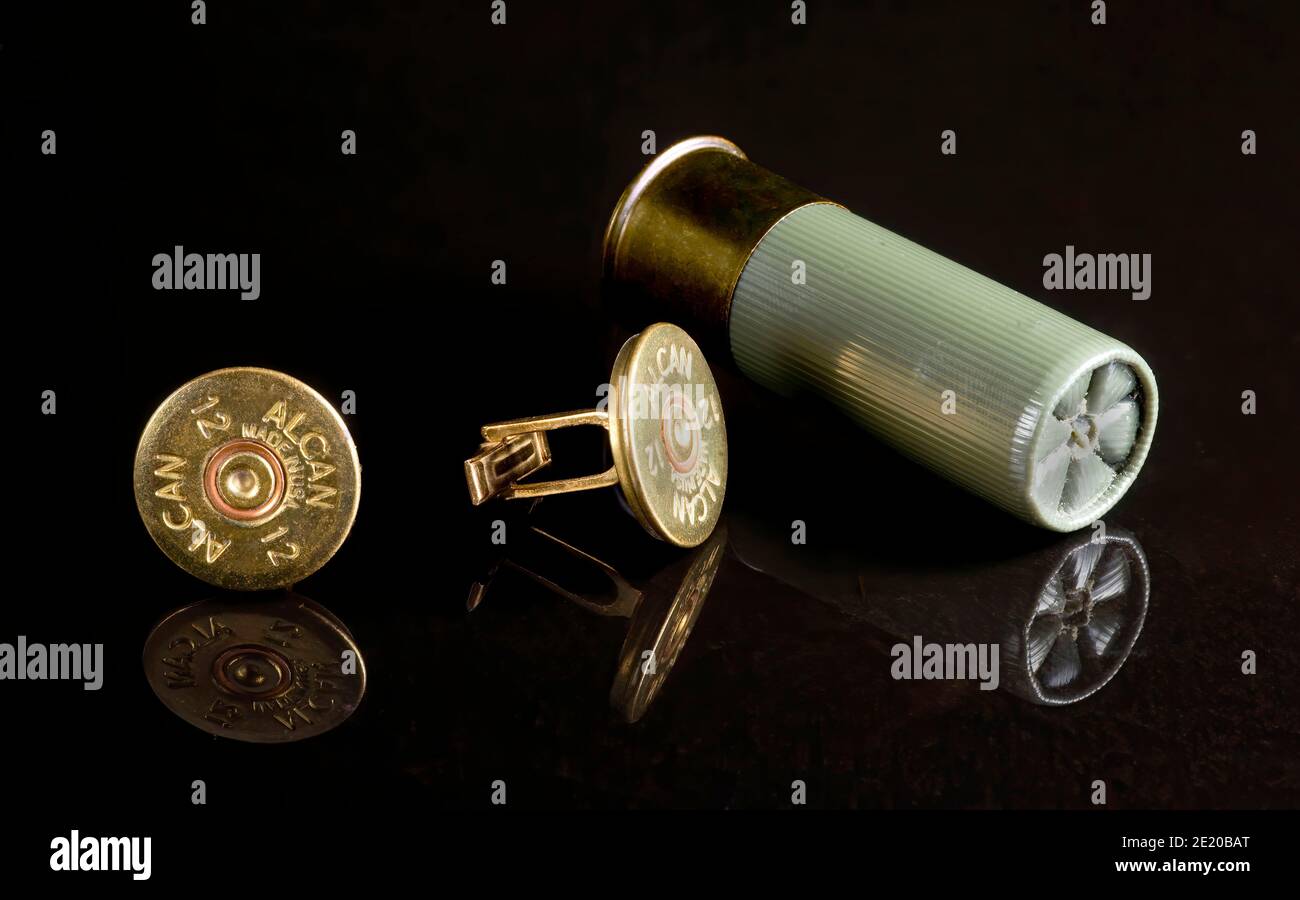 Dallas,Texas - Jan 10,2021  Antique 12 gauge shotgun shell cufflinks made in the 1950's by Alcan Co ammunition. Stock Photo