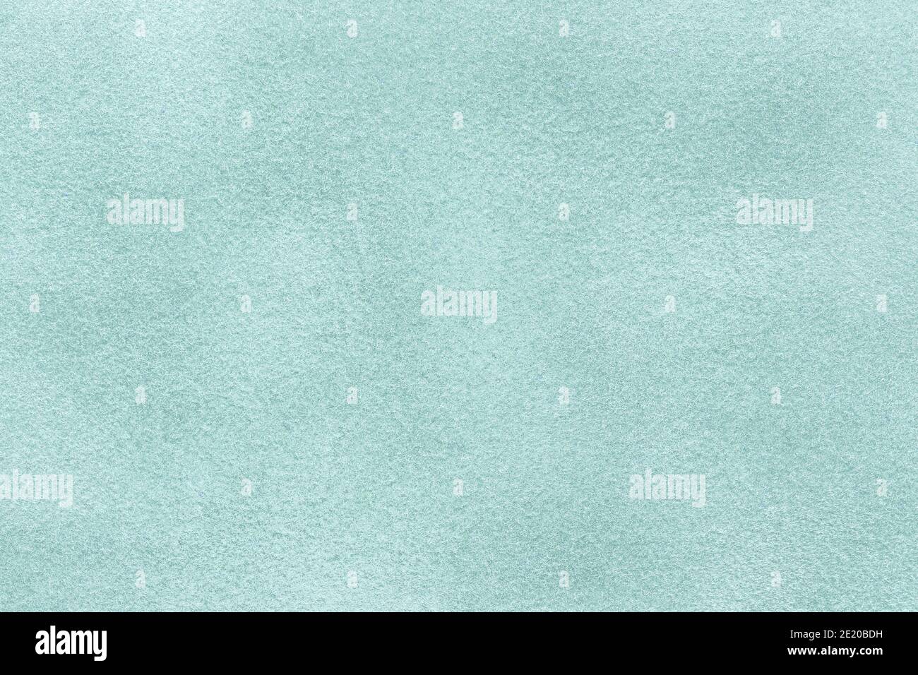 Light blue matte background of suede fabric, closeup. Velvet texture of ...