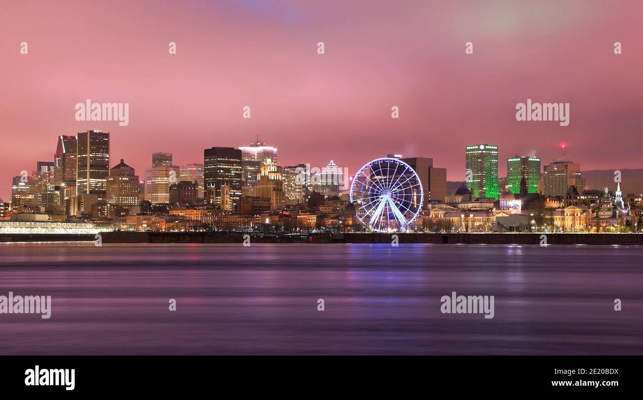 Montreal skyline at dusk and St Lawrence River, Quebec, Canada Stock Photo