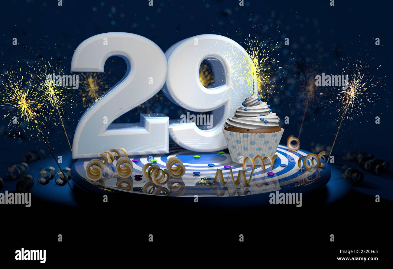 Cupcake with sparkling candle for 29th birthday or anniversary with big number in white with yellow streamers on blue table with dark background full Stock Photo