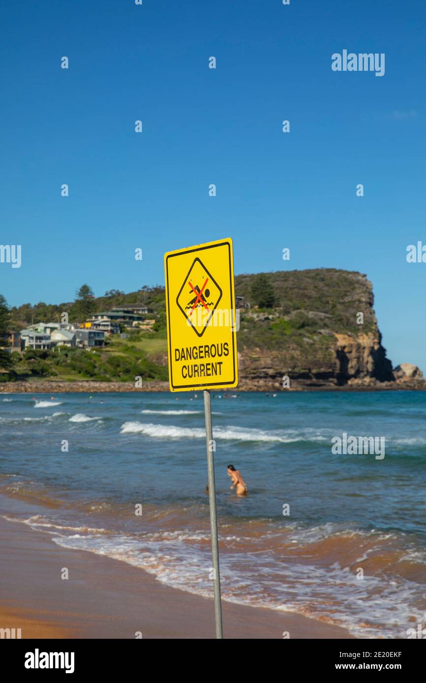 Surf rescue Dangerous current sign at a Sydney beach to warn swimmers about rips in the ocean,Sydney,Australia Stock Photo