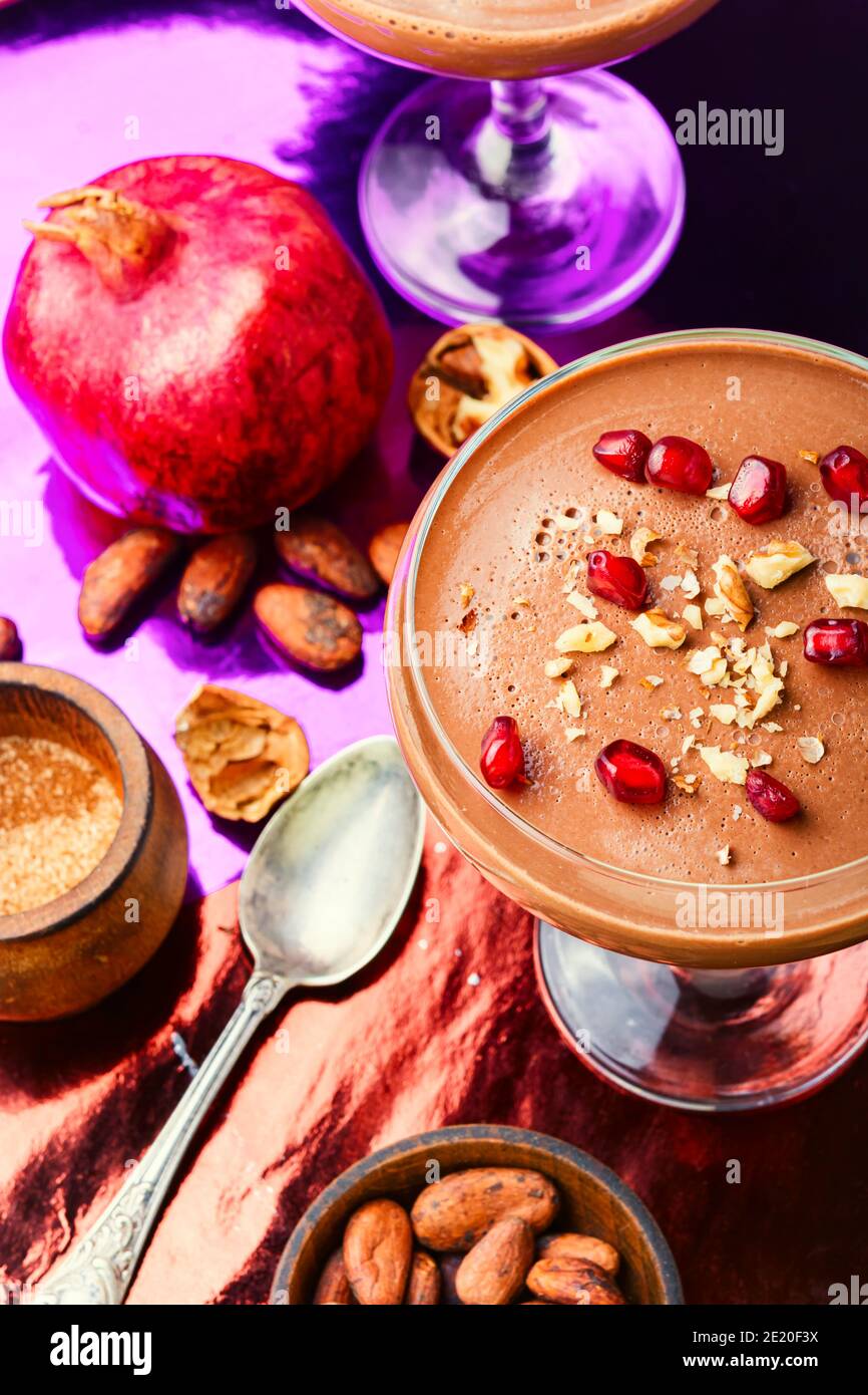Milk sweet dessert with cocoa and pomegranate Stock Photo