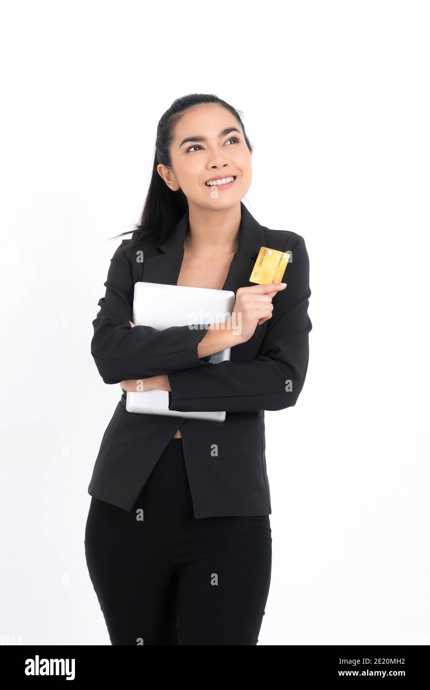 Portrait asian business woman with holding credit card and documents in hand and look up isolated on white background. Stock Photo