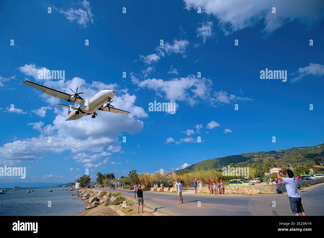 low plane flight, landing, Skiathos airpor. Difficult plane landing Stock Photo