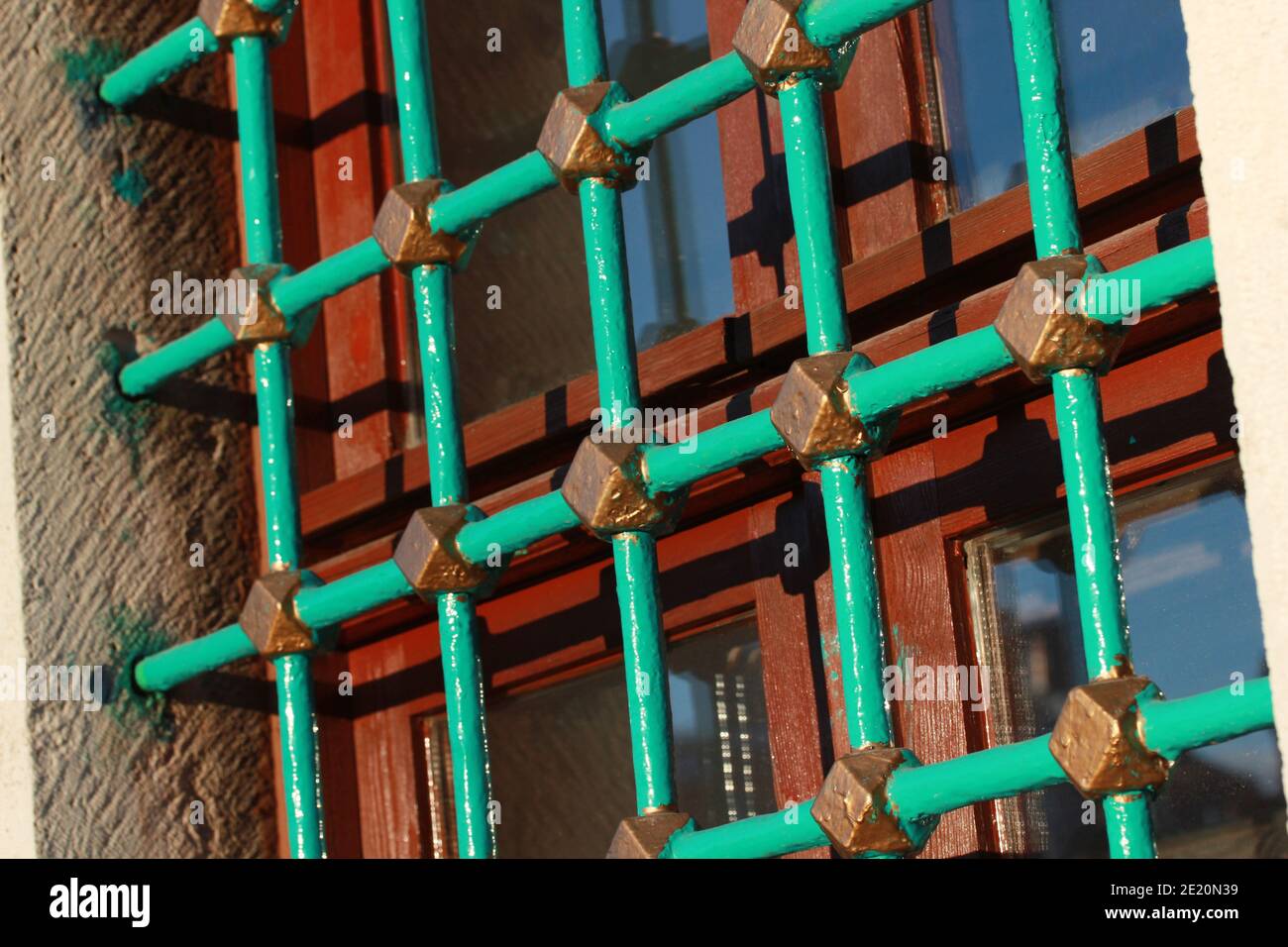 The old stone building. Metal window railing Stock Photo - Alamy
