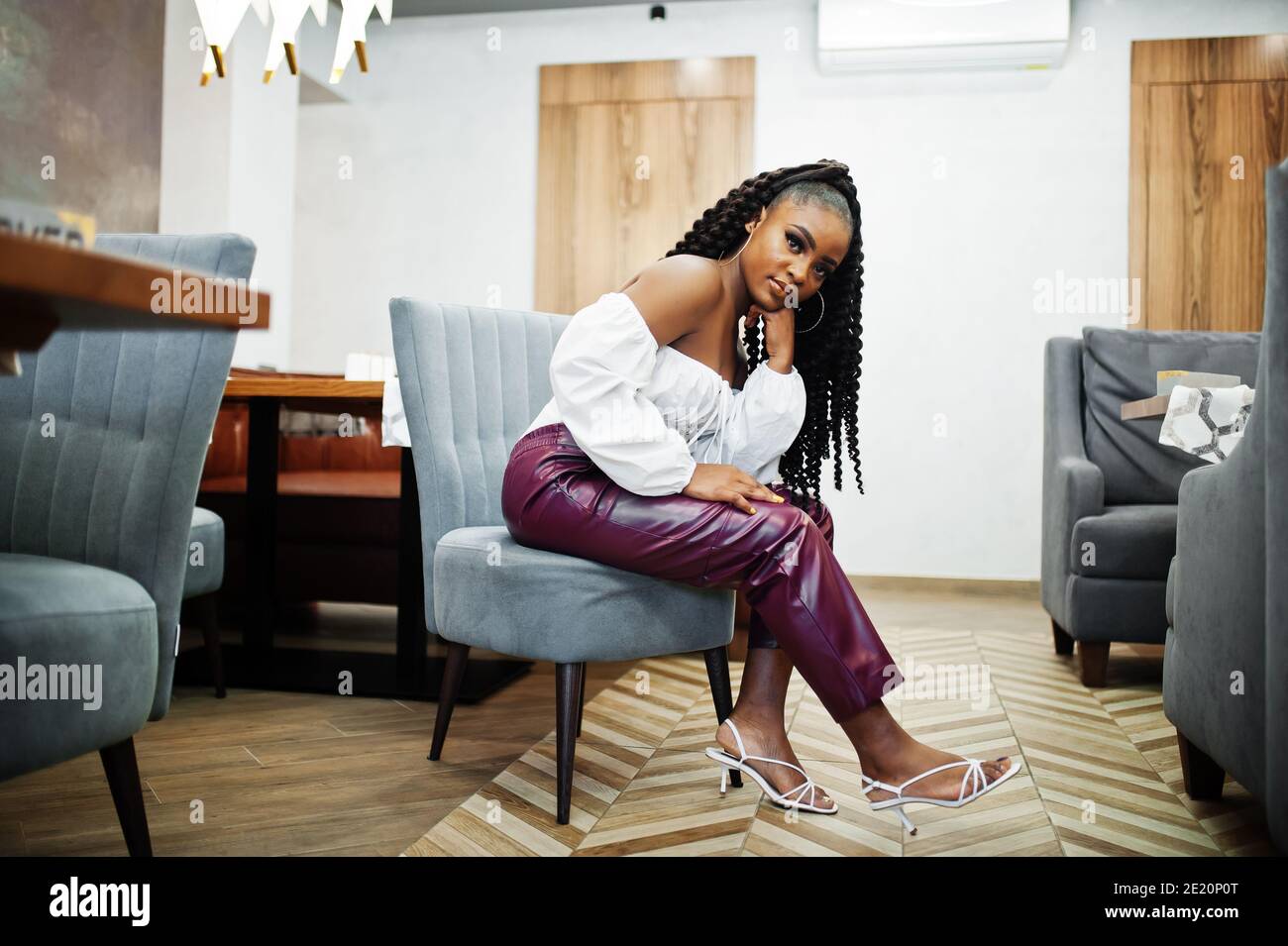 Mature woman leather pants hi-res stock photography and images - Alamy