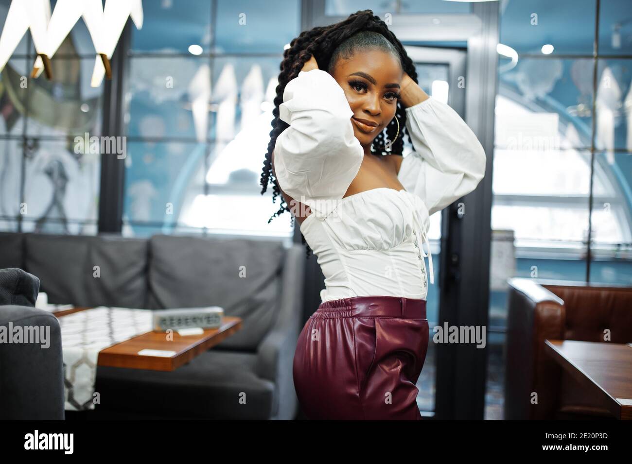 Mature woman leather pants hi-res stock photography and images - Alamy