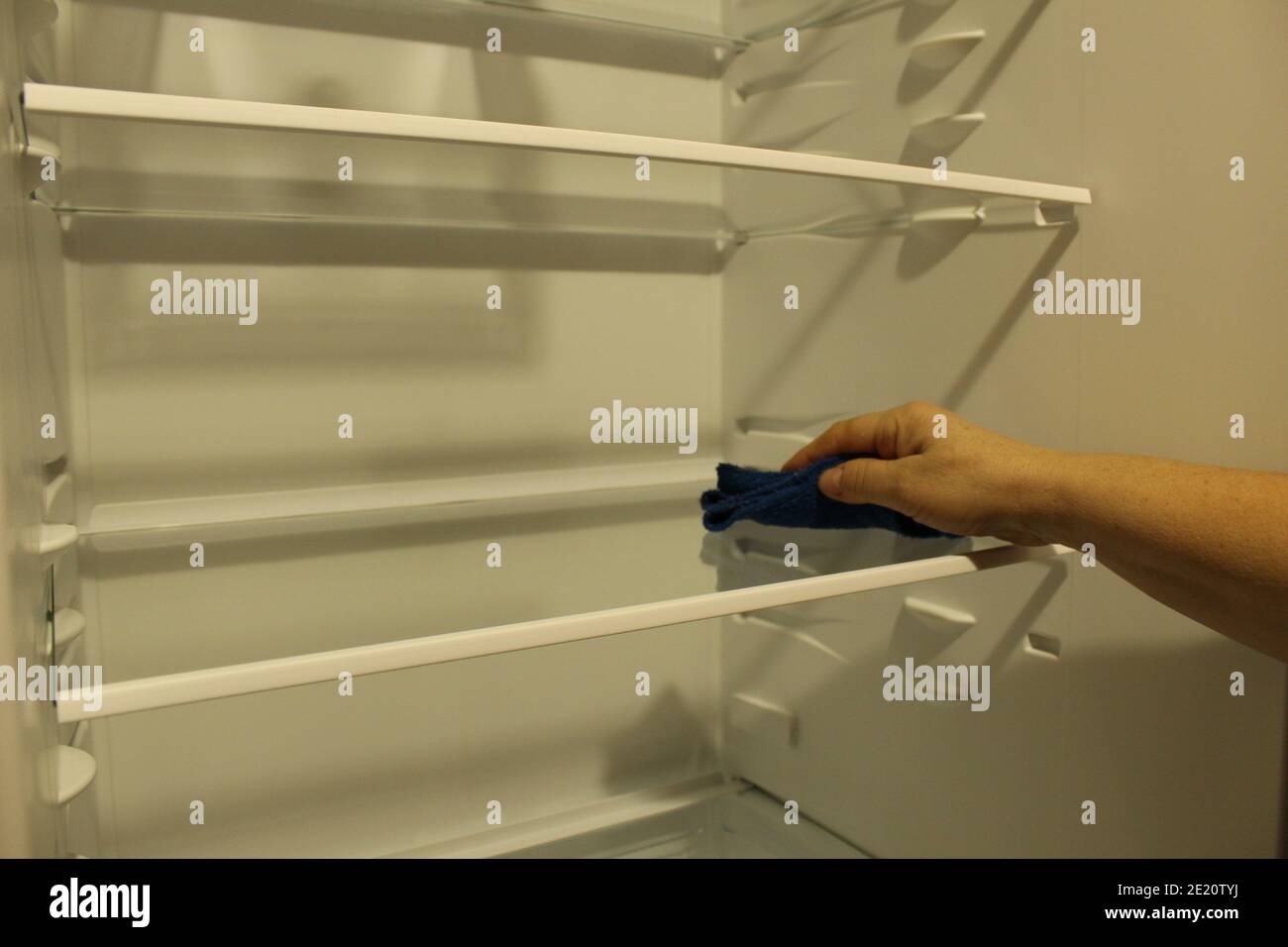Cleaning cleaning fridge sink wipes the shelf inserts the shelf Stock Photo Alamy