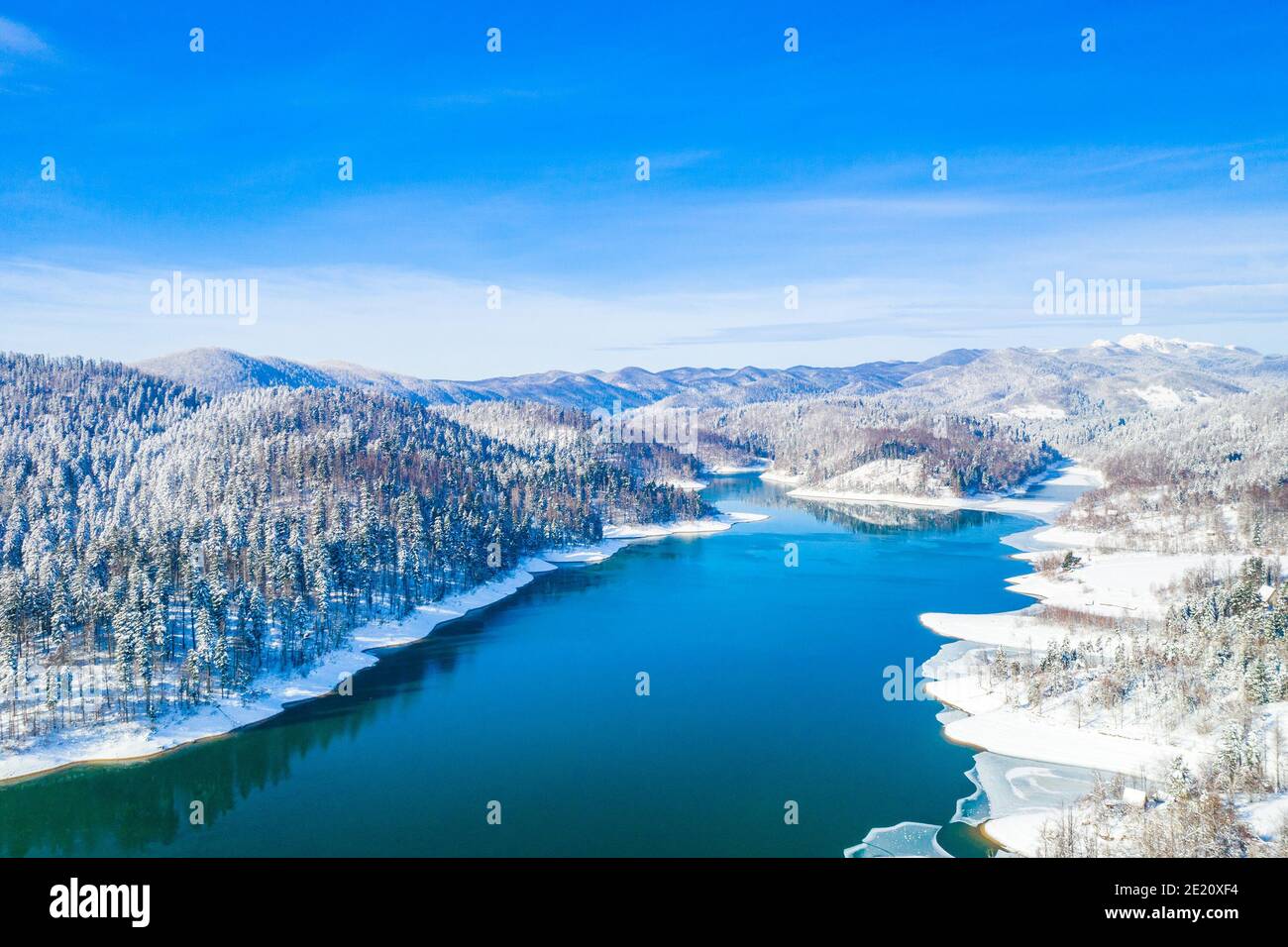 Beautiful showy winter landscape in Croatia. Panorama of Lokvarsko lake and in Gorski kotar from drone. Stock Photo