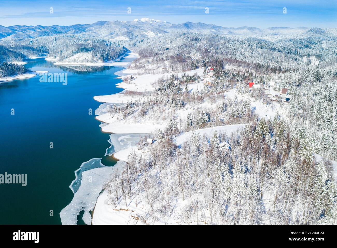 Beautiful showy winter landscape in Croatia. Panorama of Lokvarsko lake and in Gorski kotar from drone. Stock Photo