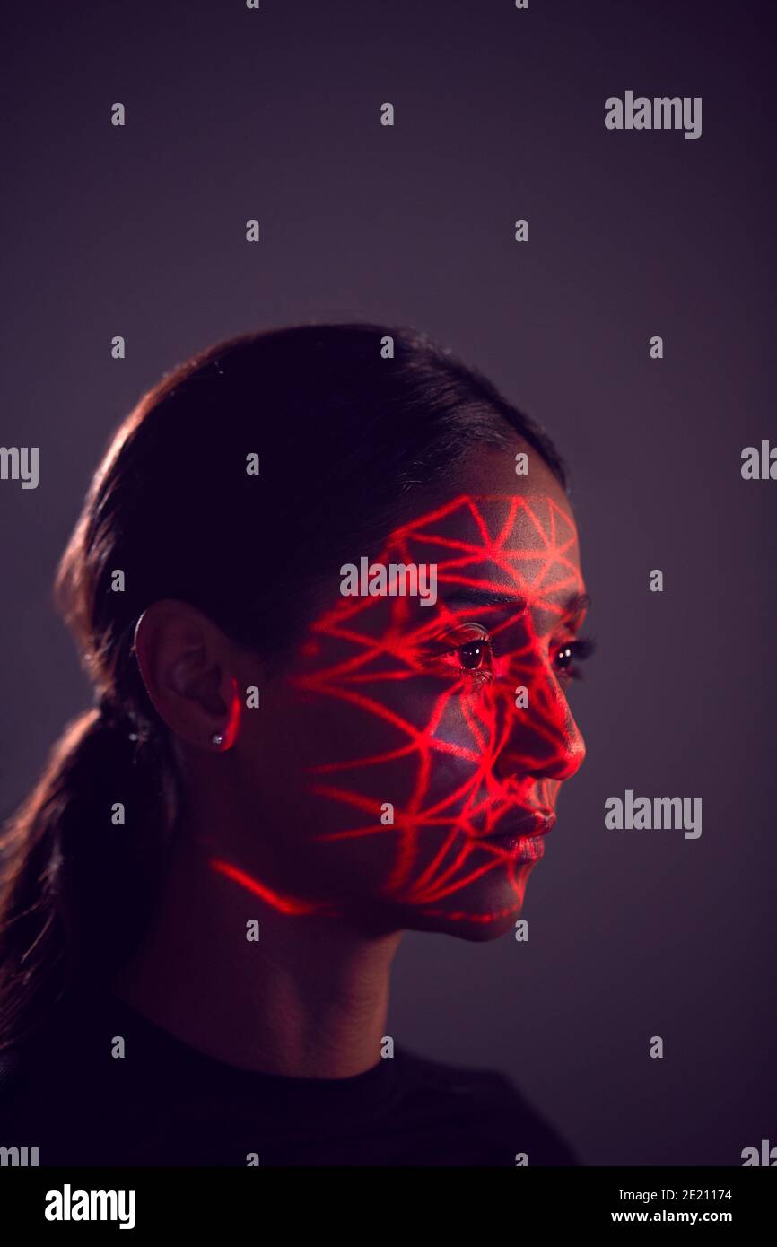 Facial Recognition Technology Concept As Woman Has Red Grid Projected ...