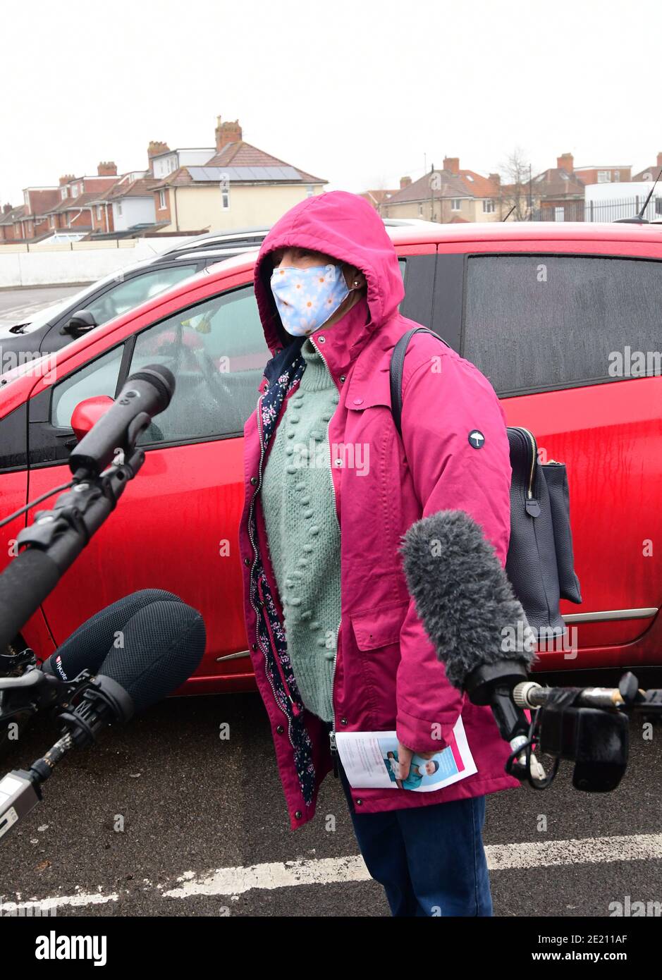 Bristol, UK. 11th Jan, 2021. Jacqueline Corney seen talking to the media having had the Oxford-Zeneca Vaccine at Ashton Gate Stadium where a Mass Vaccination rollout program Started today. Picture Credit: Robert Timoney/Alamy Live News Stock Photo
