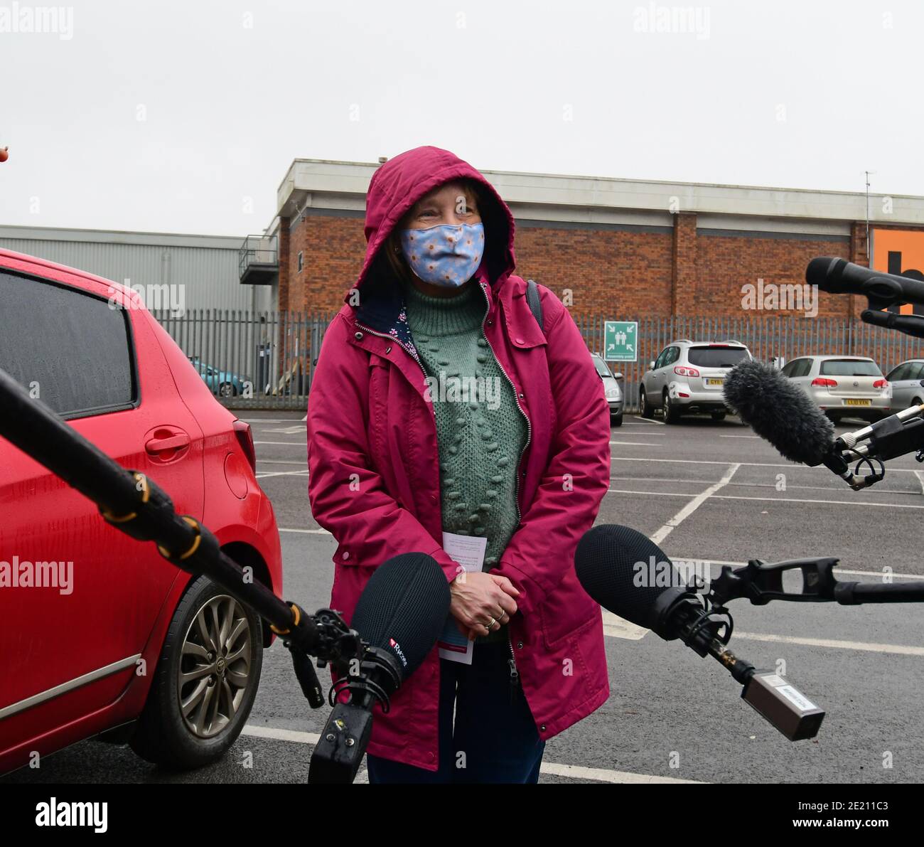 Bristol, UK. 11th Jan, 2021. Jacqueline Corney seen talking to the media having had the Oxford-Zeneca Vaccine at Ashton Gate Stadium where a Mass Vaccination rollout program Started today. Picture Credit: Robert Timoney/Alamy Live News Stock Photo