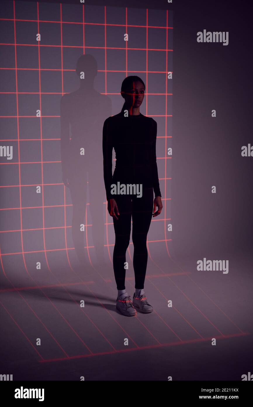 https://c8.alamy.com/comp/2E211KX/facial-recognition-technology-concept-as-woman-has-red-grid-projected-onto-body-in-studio-2E211KX.jpg