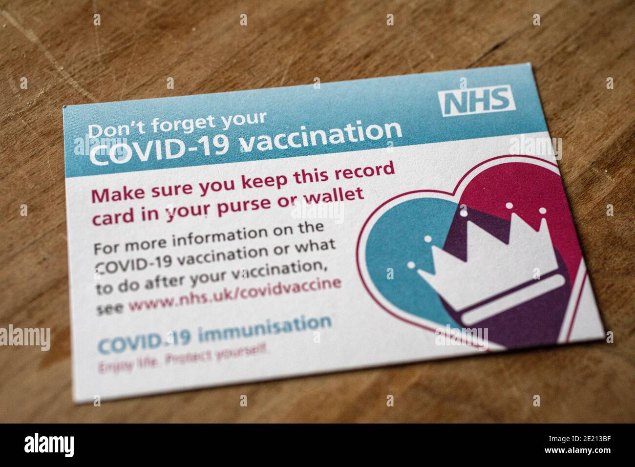 The second dose of Pfizer covid 19 vaccine is injected into Beryl Seal who, at 82 years of age, was one of the first wave of |UK citizens to receive the first and second dose of the vaccine. A ‘Vaccination Card’ was given to Mrs Seal, by the Doctors surgery after she received the second dose. 2021/01/07 Stock Photo
