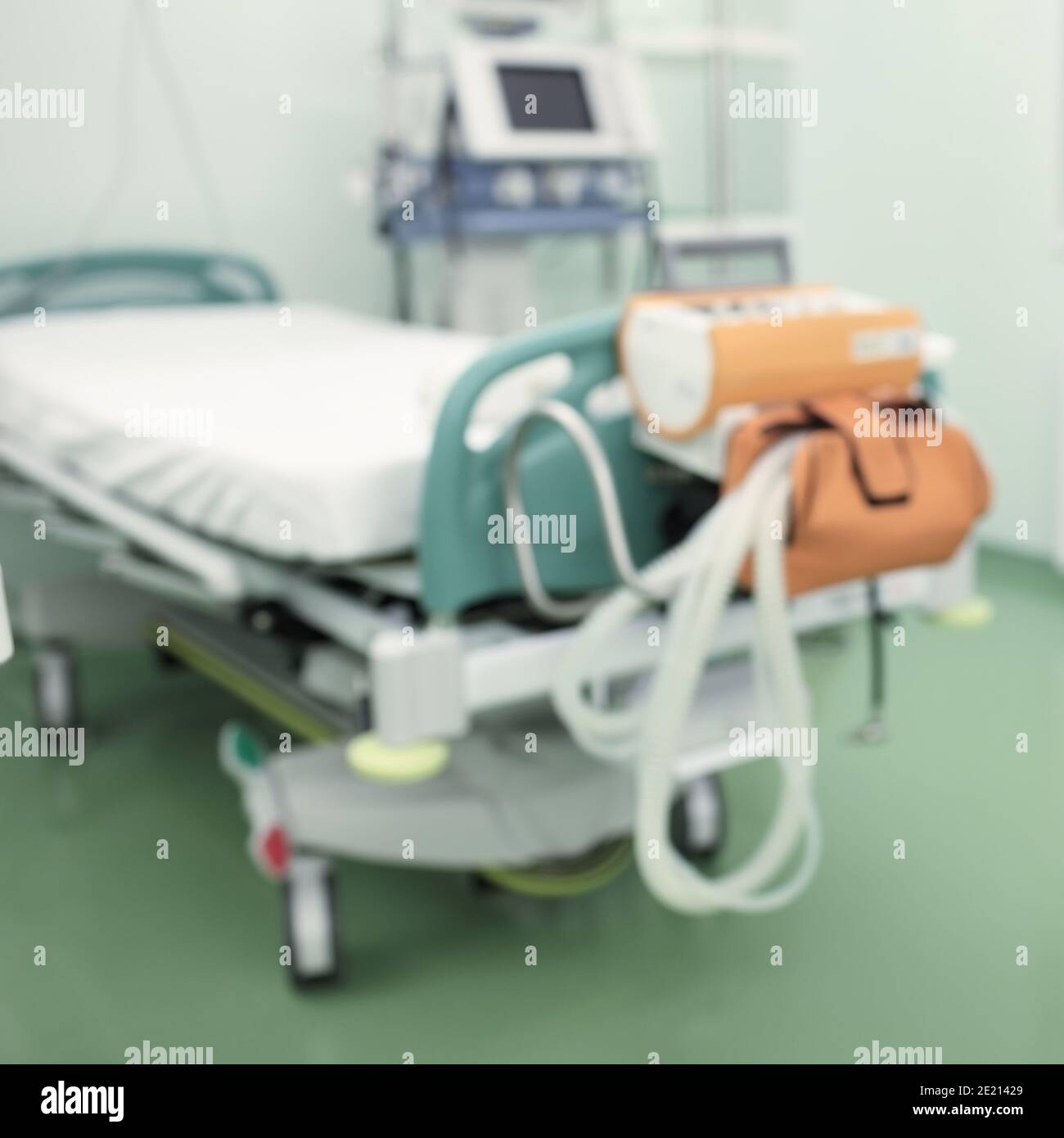 Empty hospital ward with equipment, unfocused background. Stock Photo