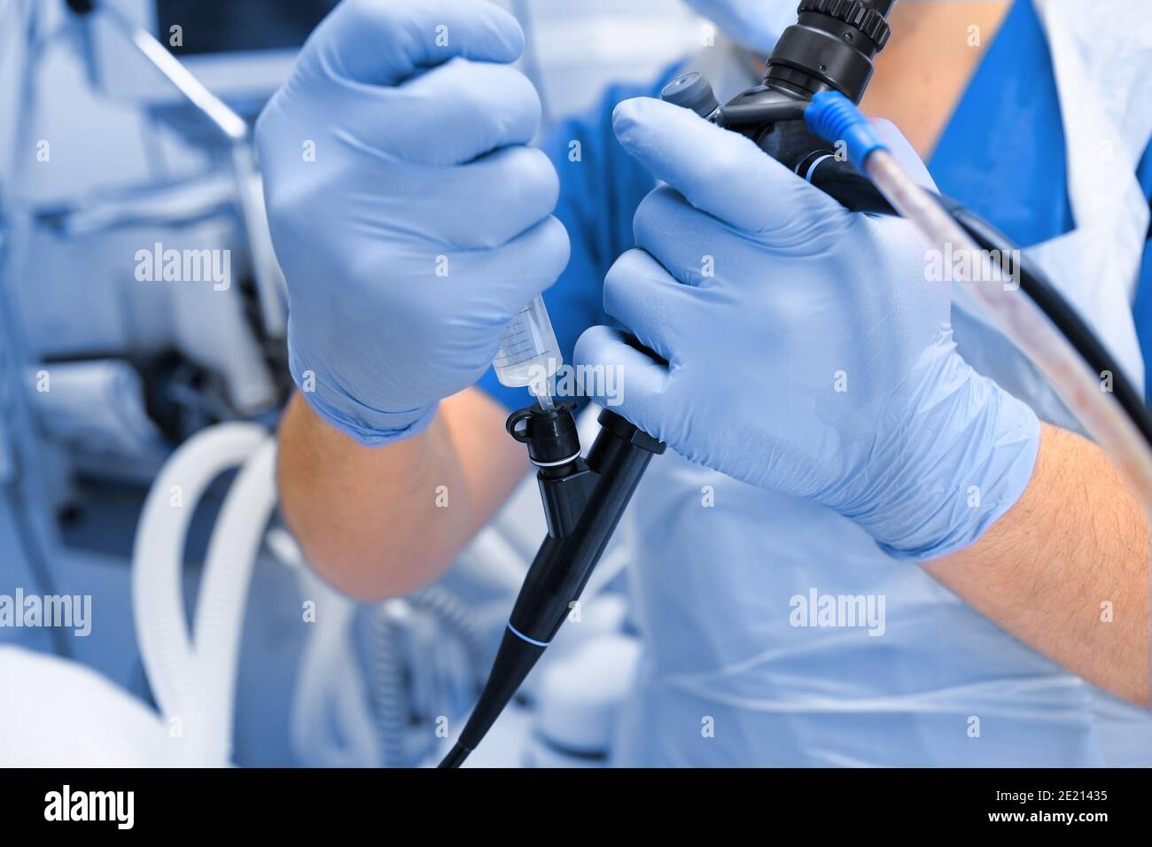 Medical procedure performing by male doctor. Stock Photo