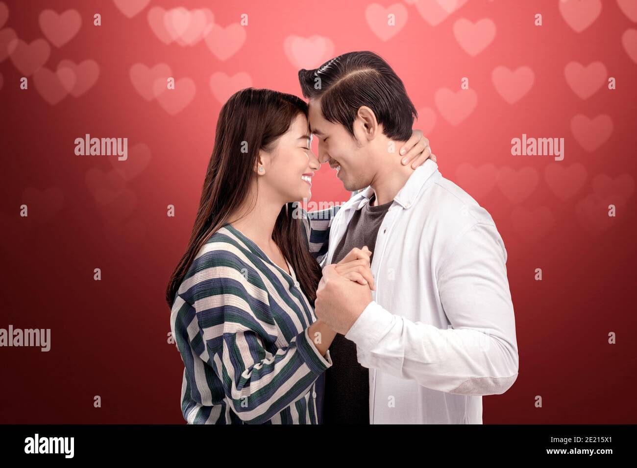 Couples holding each other hi-res stock photography and images - Alamy