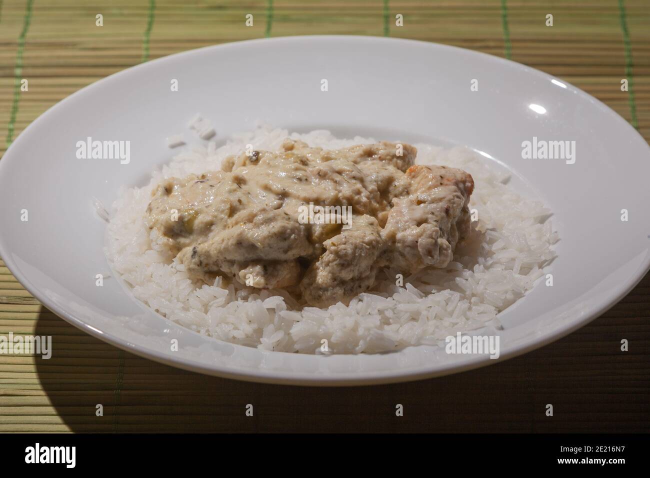Chicken Green Curry with bamboo shoots courgette and rice Stock Photo ...