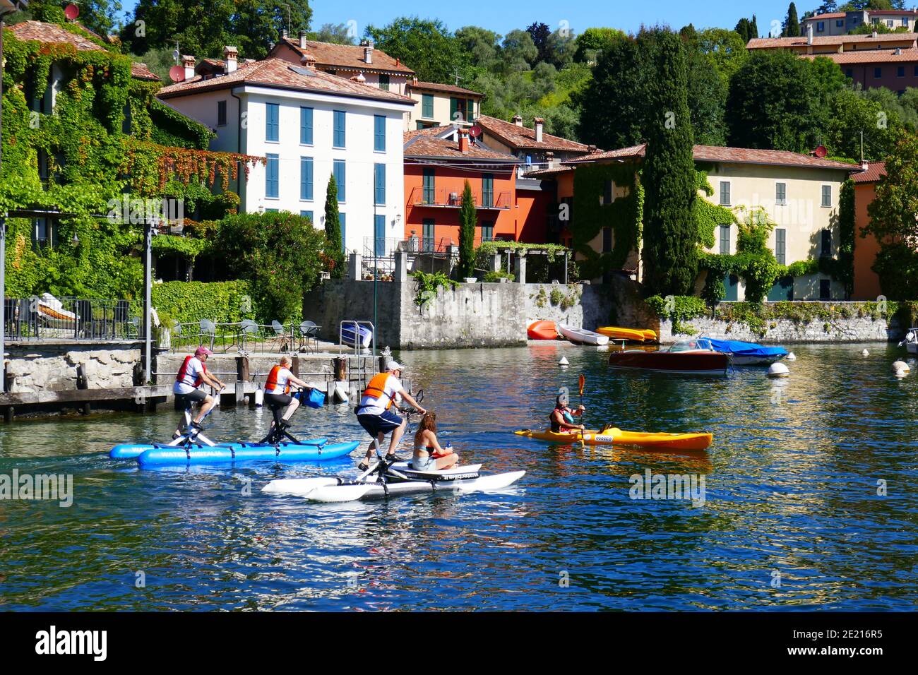 Italy, Lombardy, Como Lake, Lario, Bellagio, Pescallo - Waters, Boat, People bike, Hoses, Architecture, Stock Photo