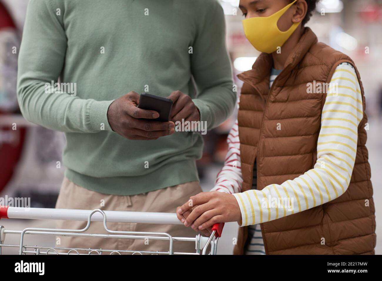 Black men wearing masks hi-res stock photography and images - Alamy