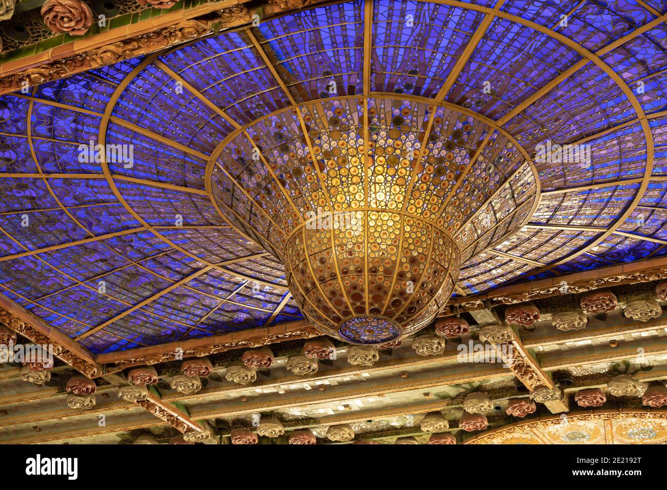 Stained-glass skylight of the Palau de la Musica Catalana's modernisme interior looks like a lamp or the Chandelier Stock Photo