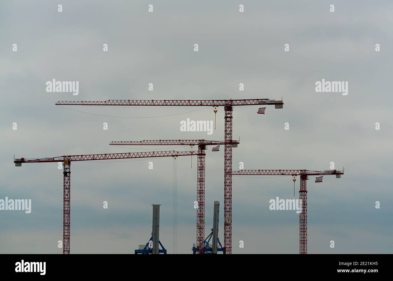 Large construction cranes on site in the port of Copenhagen. Stock Photo