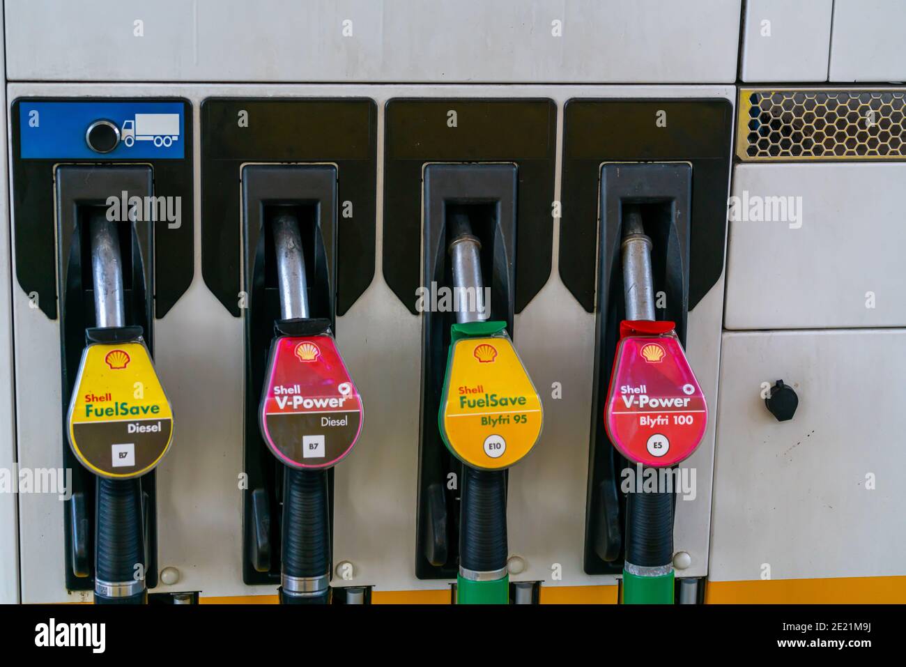 Gasoline pump station nozzles at a Shell station in Denmark. Stock Photo