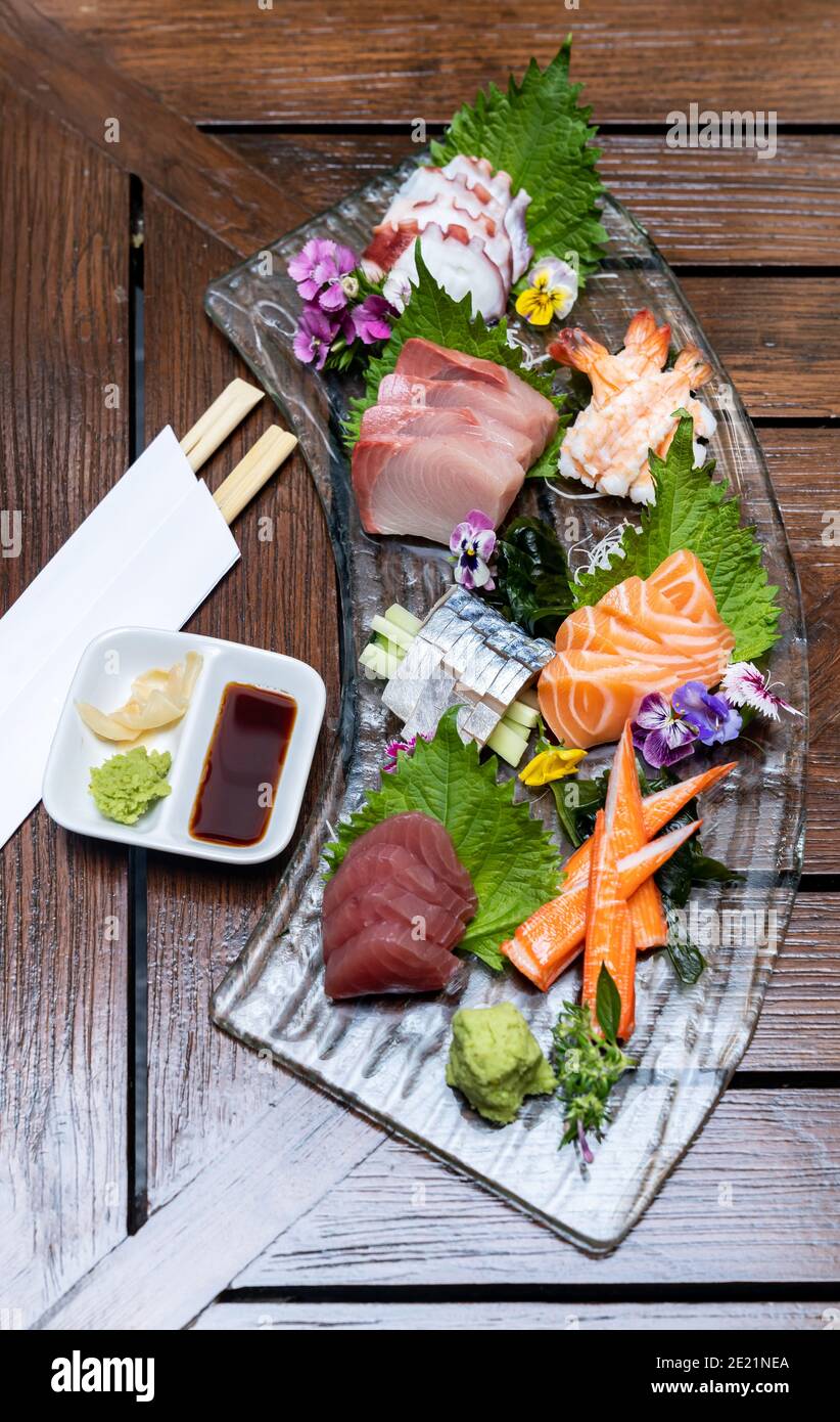 Variety of gourmet Sashimi set japanese freshness cuisine Salmon Tuna Otoro Saba Hamachi Octopus and shrimp meat. Restaurant gastronomy food and drink Stock Photo