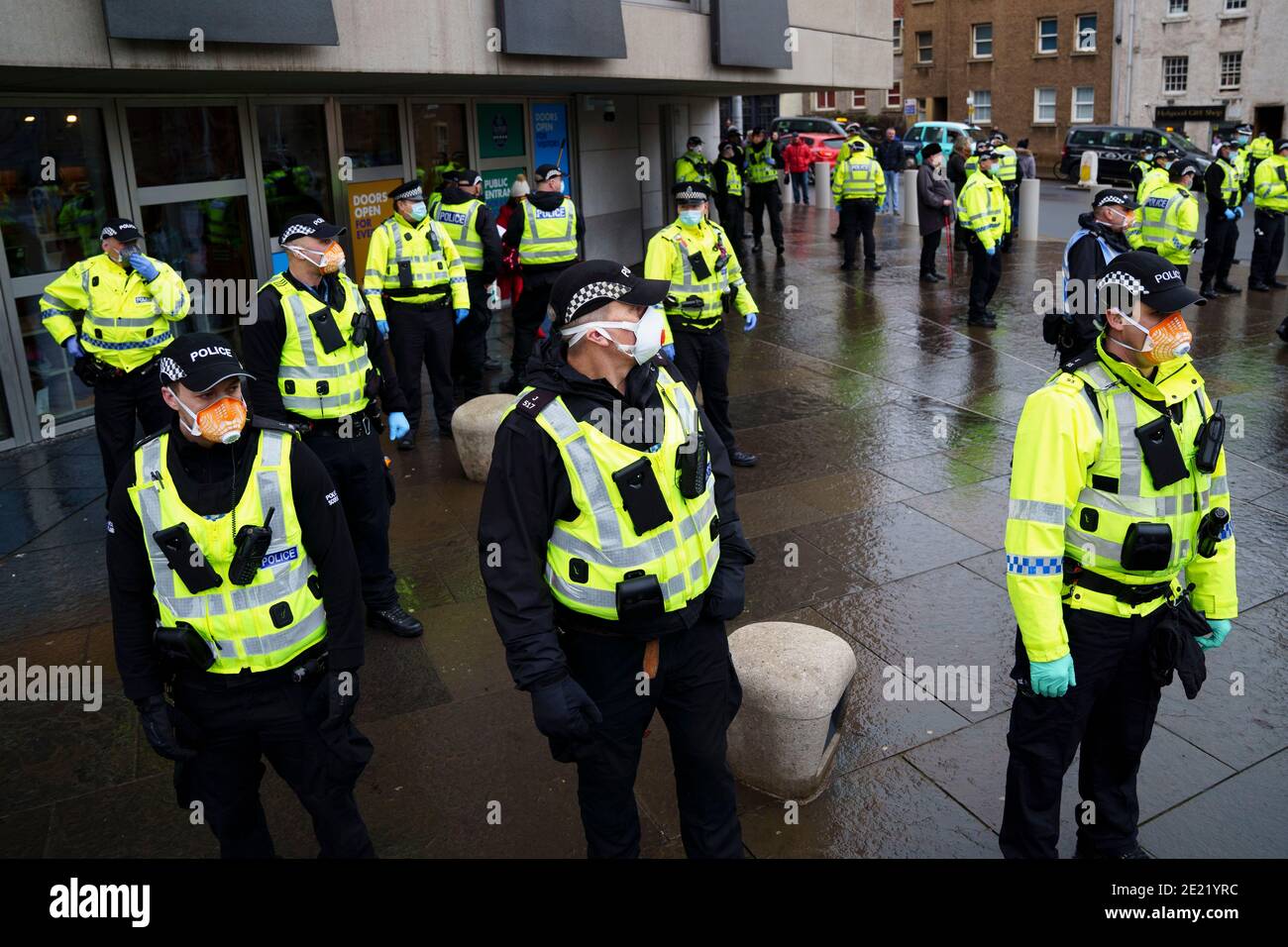 Edinburgh, Scotland, UK. 11 January 2021. Protester arrested in violent scenes at anti lockdown demonstration at Scottish Parliament in Edinburgh today. Several protesters took part but  a heavy and aggressive police presence prevented demonstration and planned march to Bute House. During national Covid-19 lockdown such protests are illegal and police advised people not to attend the demonstration. Iain Masterton/Alamy Live News Stock Photo