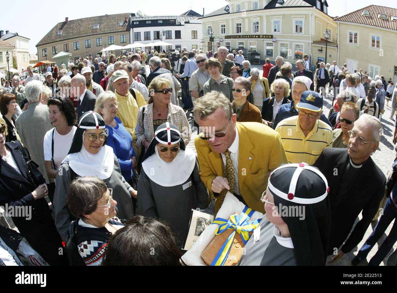 VADSTENA, SWEDEN- 31 MAY 2003:Celebration in Vadstena regarding the 700th anniversary of Saint Birgitta's birth. Governor Björn Eriksson with nuns on Stora Torget in Vadstena. Stock Photo