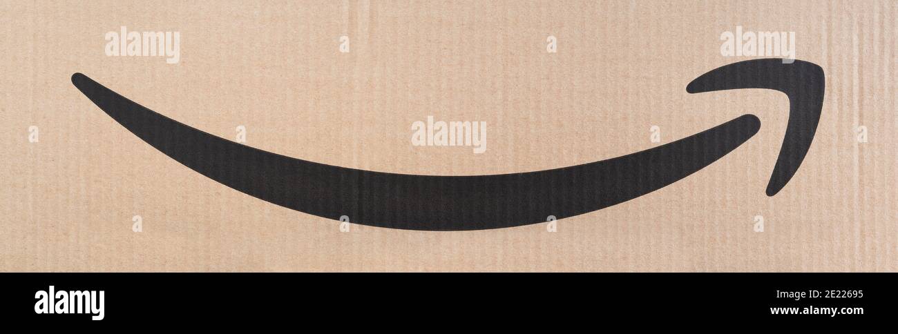 Panoramic shot of Amazon logo on Amazon Prime shipping box. Stock Photo