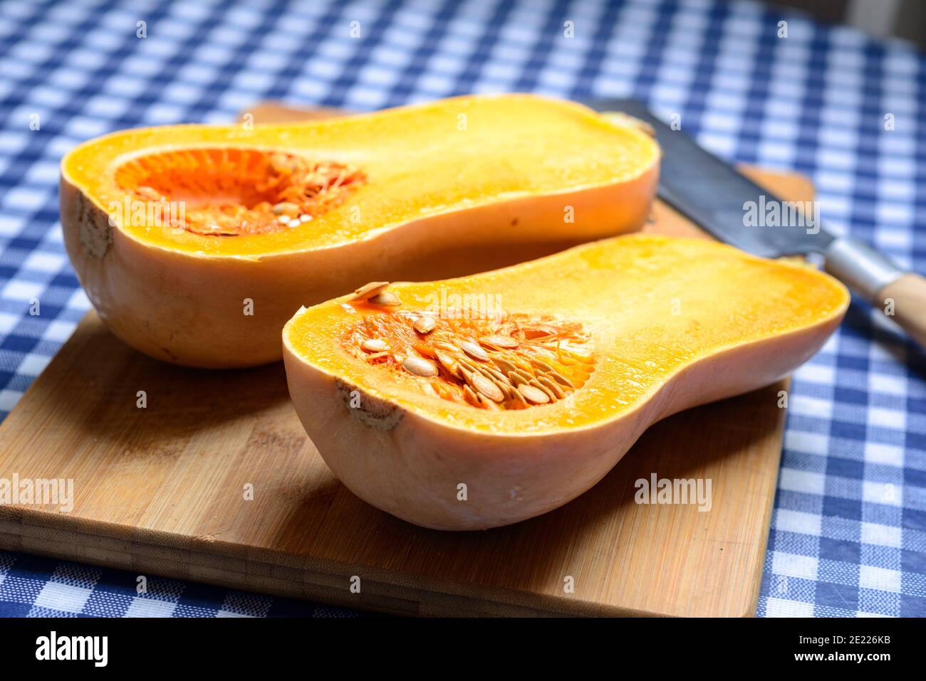 Butternut Squash, cut in half-Cucurbita moschata 'Butternut' Stock Photo