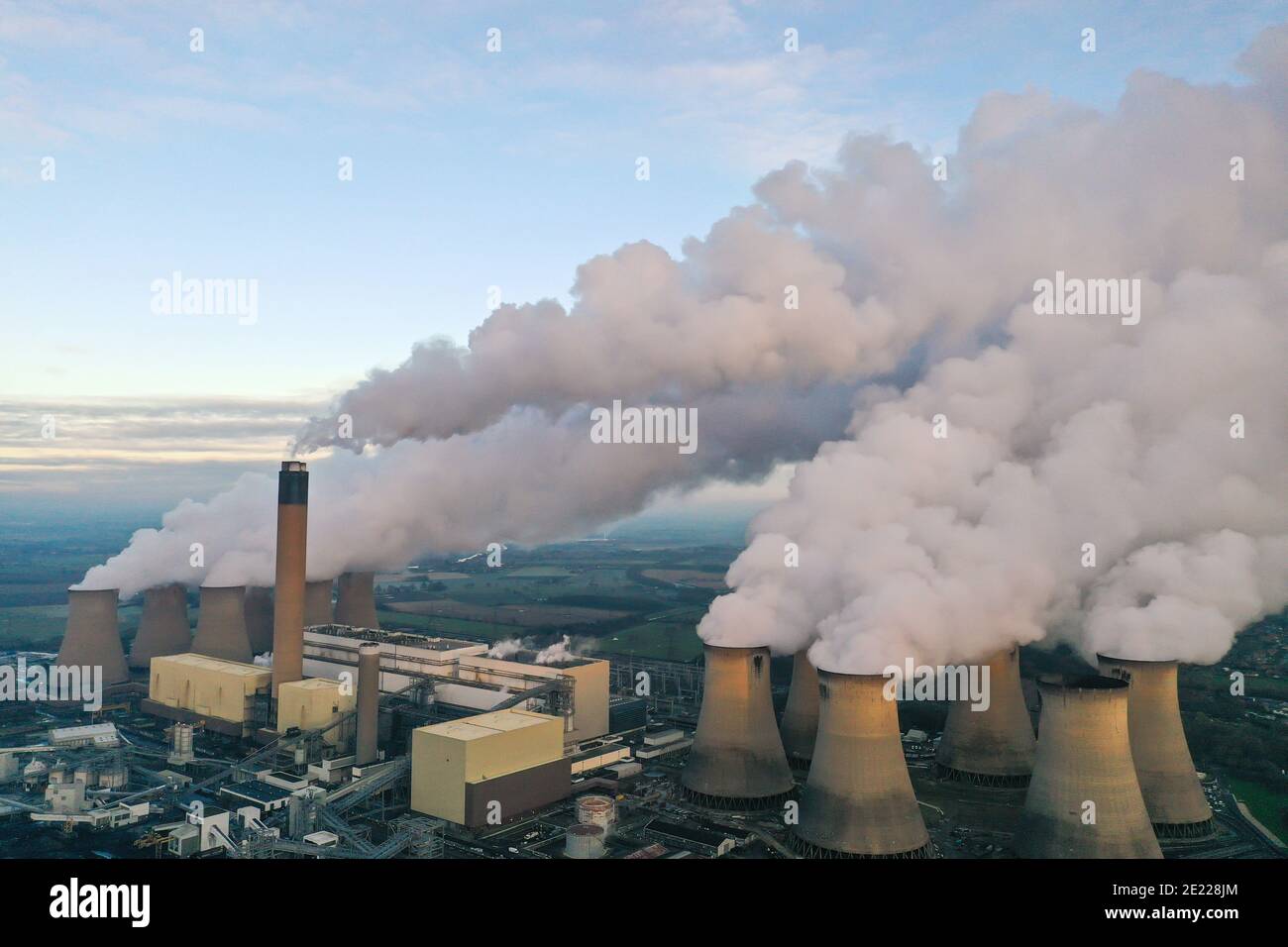DRAX POWER STATION, YORKSHIRE, UK - JANUARY 7, 2021.  An aerial landscape image of Drax Coal Fired Power Station pumping steam and smoke from its chim Stock Photo